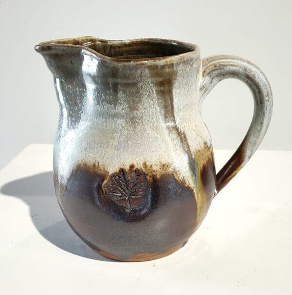 Tan and Brown Pitcher