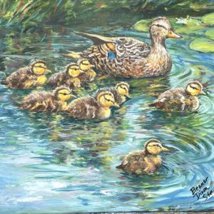 Ducklings Following Mama