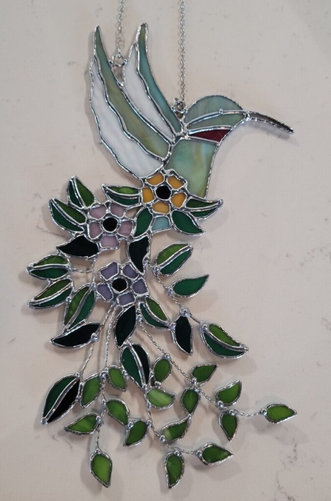 Hummingbird with Flower and Leaf Tail