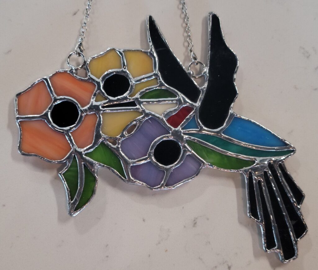Hummingbird with Three Flowers